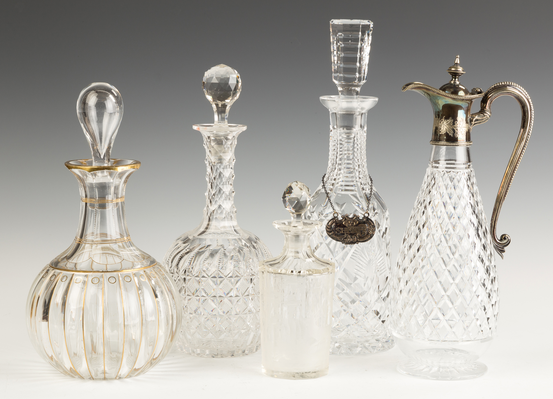 Appraisal: Group of Various Cut Glass and Etched Decanters and Ewer