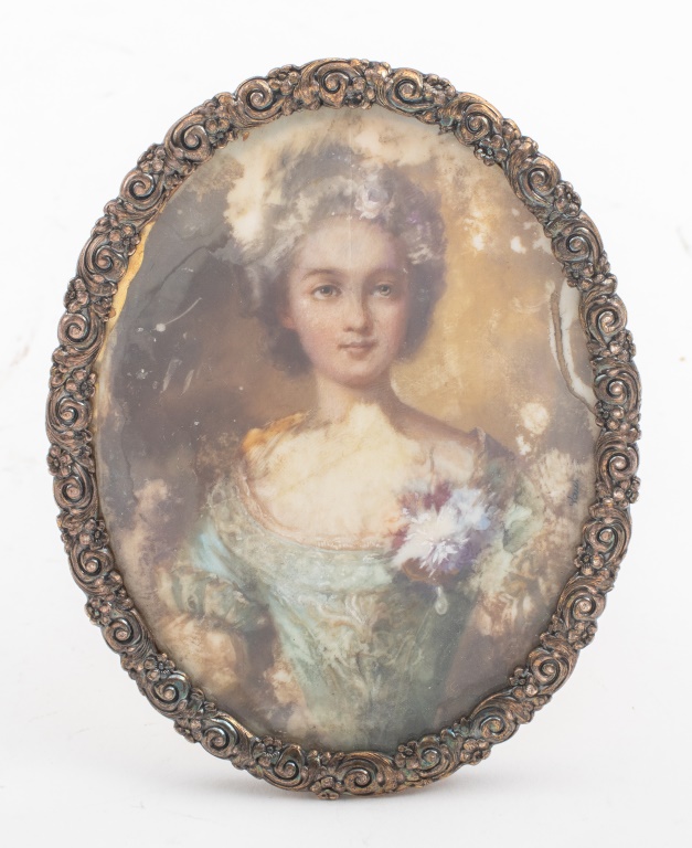 Appraisal: MINIATURE PORTRAIT OF A WOMAN IN TIFFANY FRAME Portrait miniature