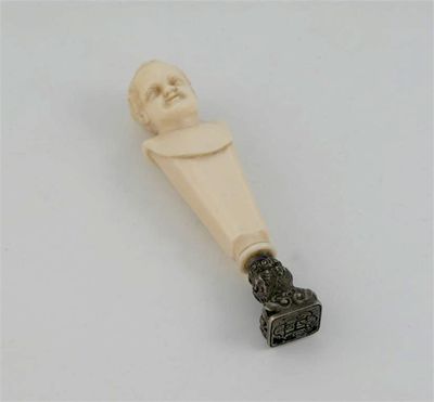 Appraisal: A th century mounted ivory seal the handle carved in