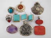 Appraisal: A quantity of white metal tests silver jewellery comprising pendants