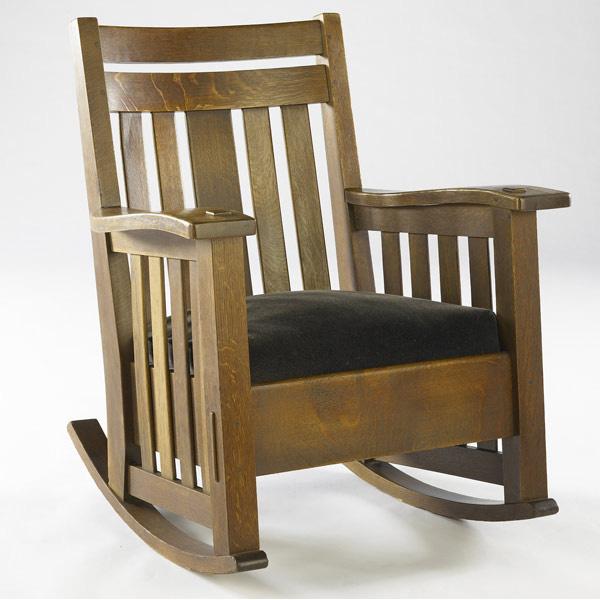 Appraisal: HARDEN Slatted rocker with drop-in spring seat covered in gray