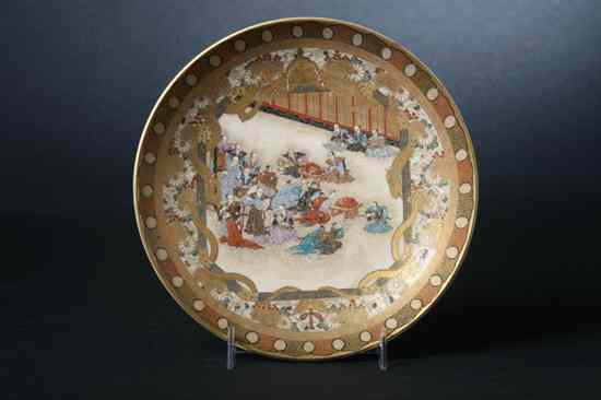 Appraisal: JAPANESE SATSUMA EARTHENWARE PLATE Meiji Period signed figural decoration within