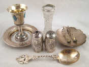 Appraisal: A silver kiddush cup marked a silver coaster rim London