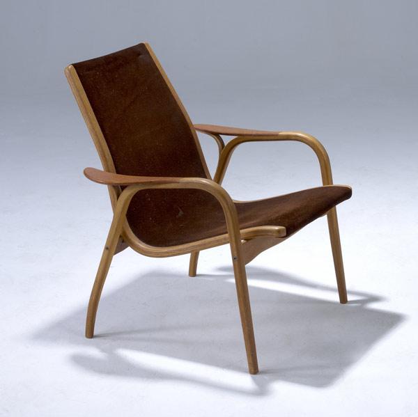 Appraisal: YNGVE EKSTROM Lounge chair with teak frame leather seat Branded