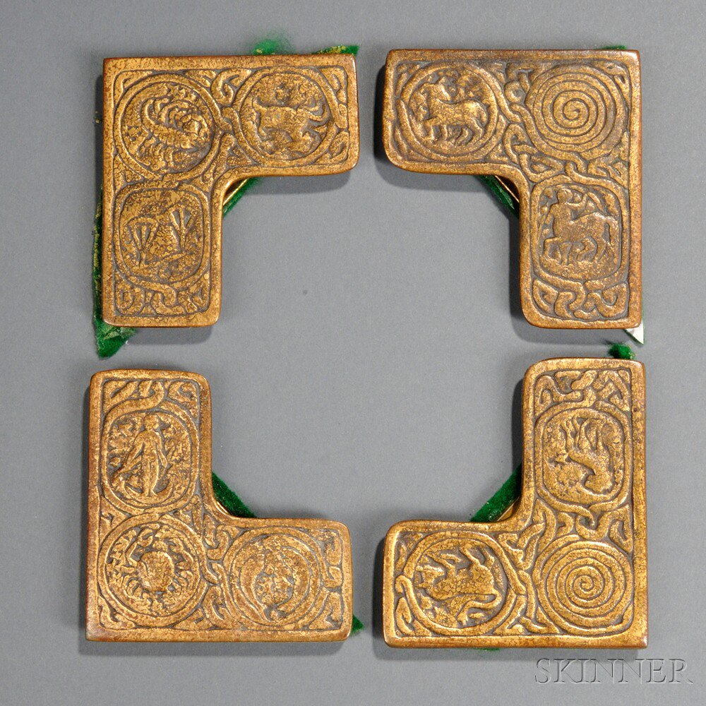 Appraisal: Tiffany Studios Zodiac Blotter Corners Bronze dore Four shaped corners