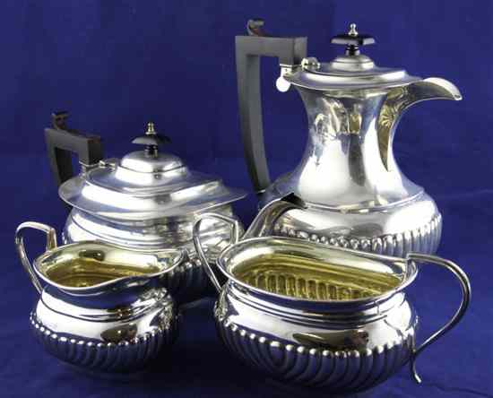 Appraisal: A George V demi fluted silver piece tea and coffee