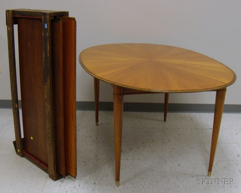 Appraisal: Charak Modern Oval Blondewood Veneered Mahogany Dining Table with two