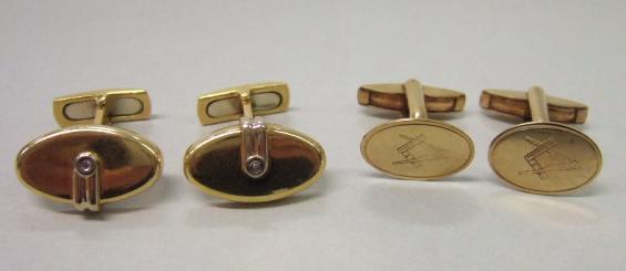 Appraisal: A pair of gold and diamond set cufflinks with oval