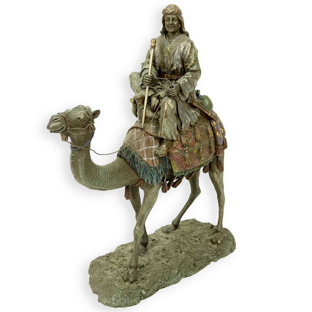 Appraisal: Vintage Polychrome Composition Arab on Camelback Vintage Polychrome Composition Arab