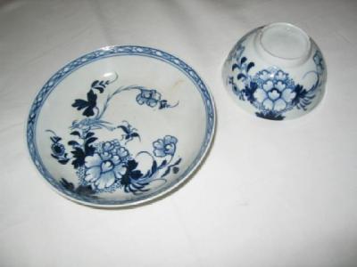 Appraisal: A LIVERPOOL PORCELAIN TEA BOWL AND SAUCER painted in the