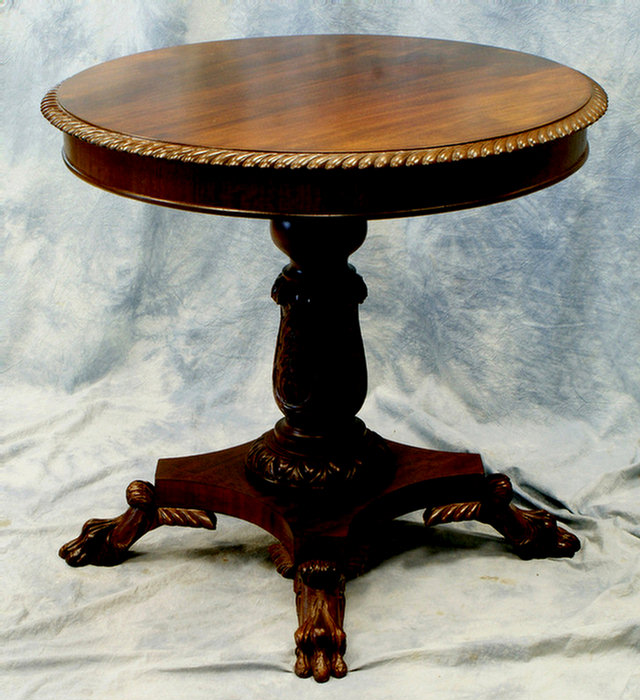 Appraisal: Carved mahogany Federal style center table with gadrooned edge and