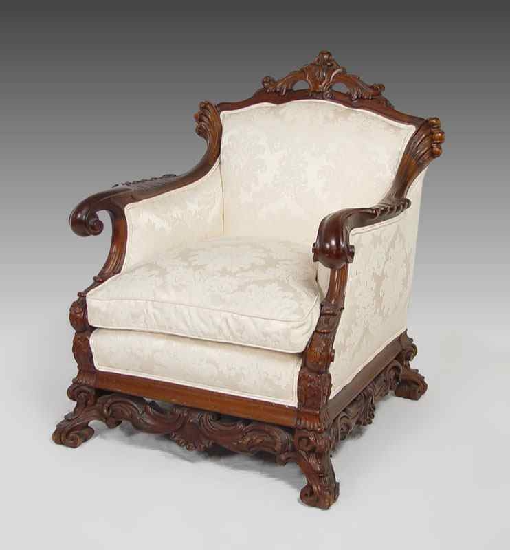 Appraisal: ITALIAN CARVED UPHOLSTERED PARLOR CHAIR Heavy carved walnut frame with