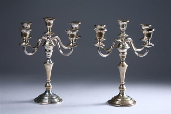 Appraisal: PAIR PREISNER STERLING SILVER FIVE-LIGHT CANDELABRA Circular foot baluster-form standard