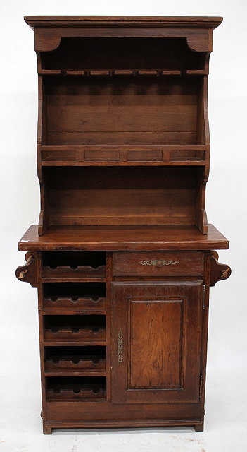 Appraisal: A FRENCH OAK KITCHEN DRESSER the upper sections with glasses