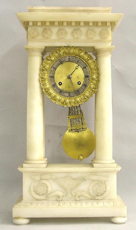 Appraisal: Interesting French portico white marble two train clock the movement