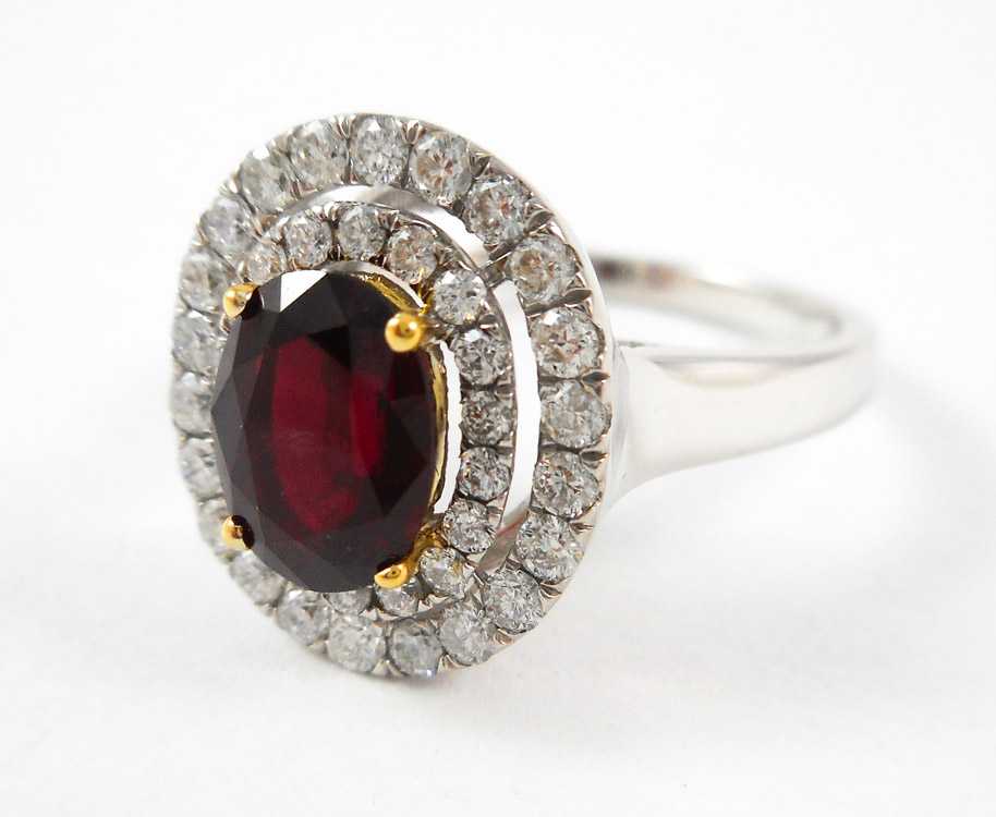 Appraisal: RUBY DIAMOND AND FOURTEEN KARAT GOLD RING The white and