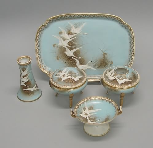 Appraisal: Featuring swan design on turquoise ground composing of a tray