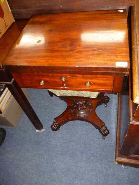 Appraisal: AN EARLY VICTORIAN MAHOGANY FOLD OVER WORK TABLE with single