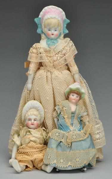 Appraisal: Lot of German Bisque Bonnet Head Dolls Description Hertwig girl