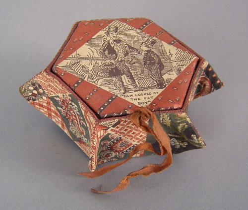 Appraisal: Fabric covered hexagonal sewing box with lift lid and printed