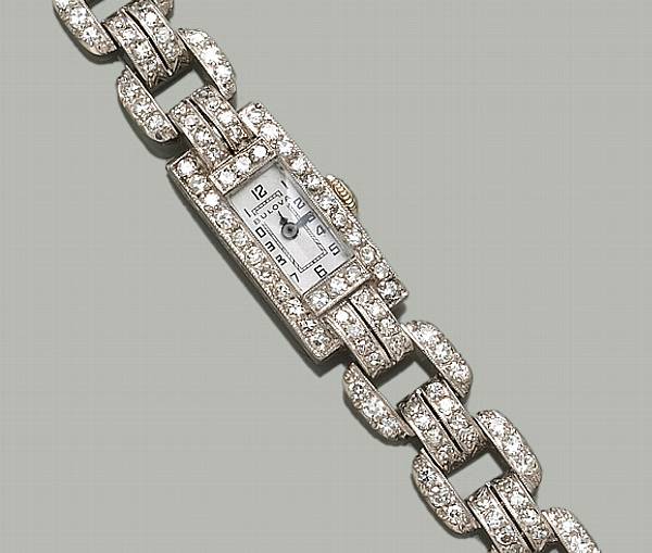 Appraisal: A lady's art deco diamond platinum and eighteen karat white