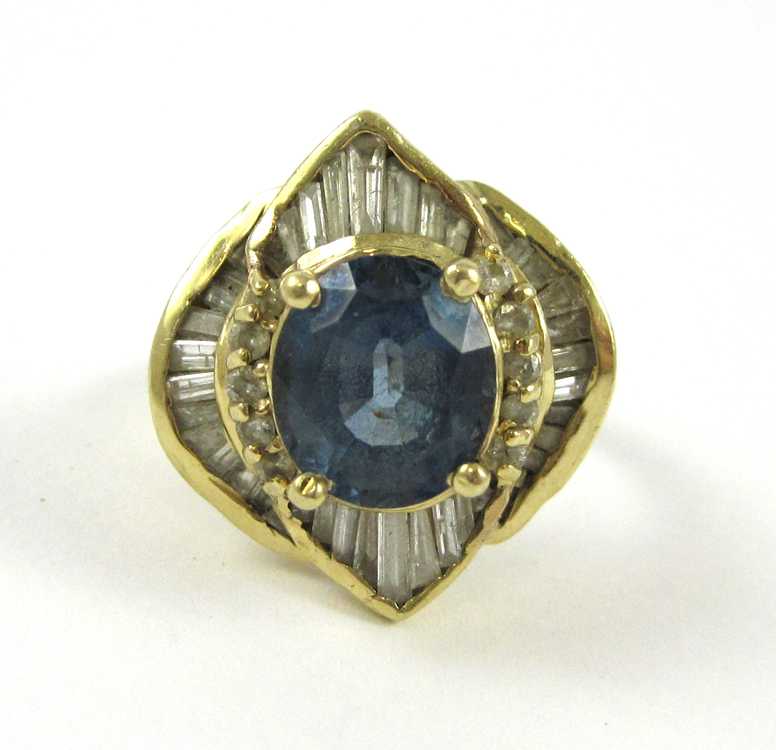 Appraisal: SPINEL DIAMOND AND FOURTEEN KARAT GOLD RING with round-cut and