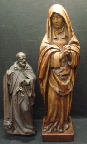 Appraisal: Antique Carved Wood Statues A Madonna and a Monk probably