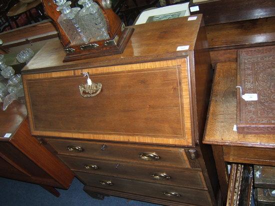 Appraisal: An Edwardian mahogany bureau the interior fitted with pigeon holes