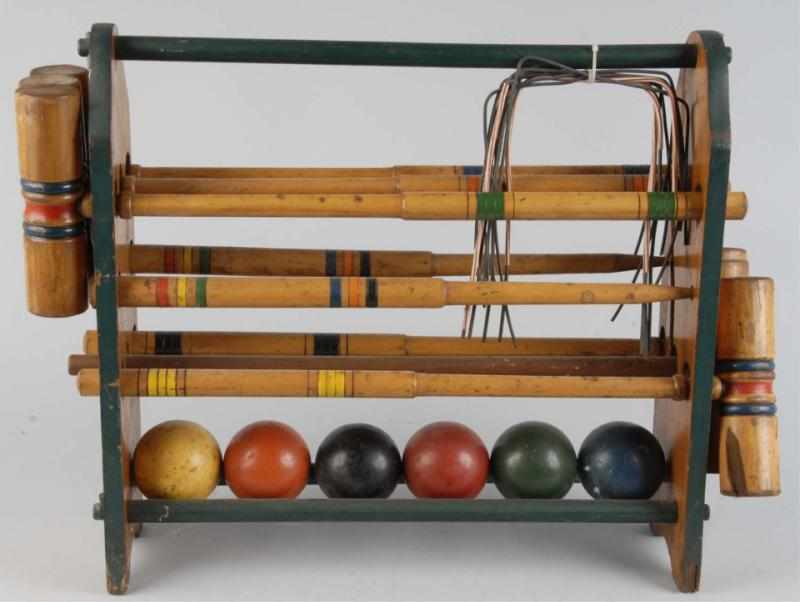 Appraisal: Wooden Vintage Croquet Game Set Description Circa s Includes six