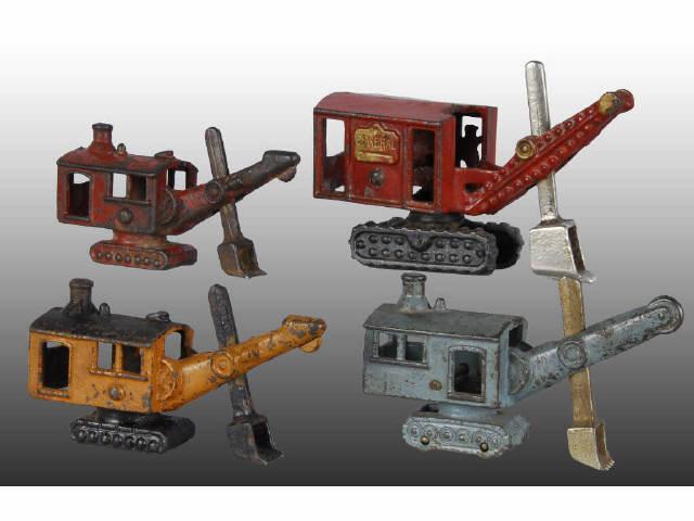 Appraisal: Lot of Cast Iron Steam Shovel Toys Description Two small