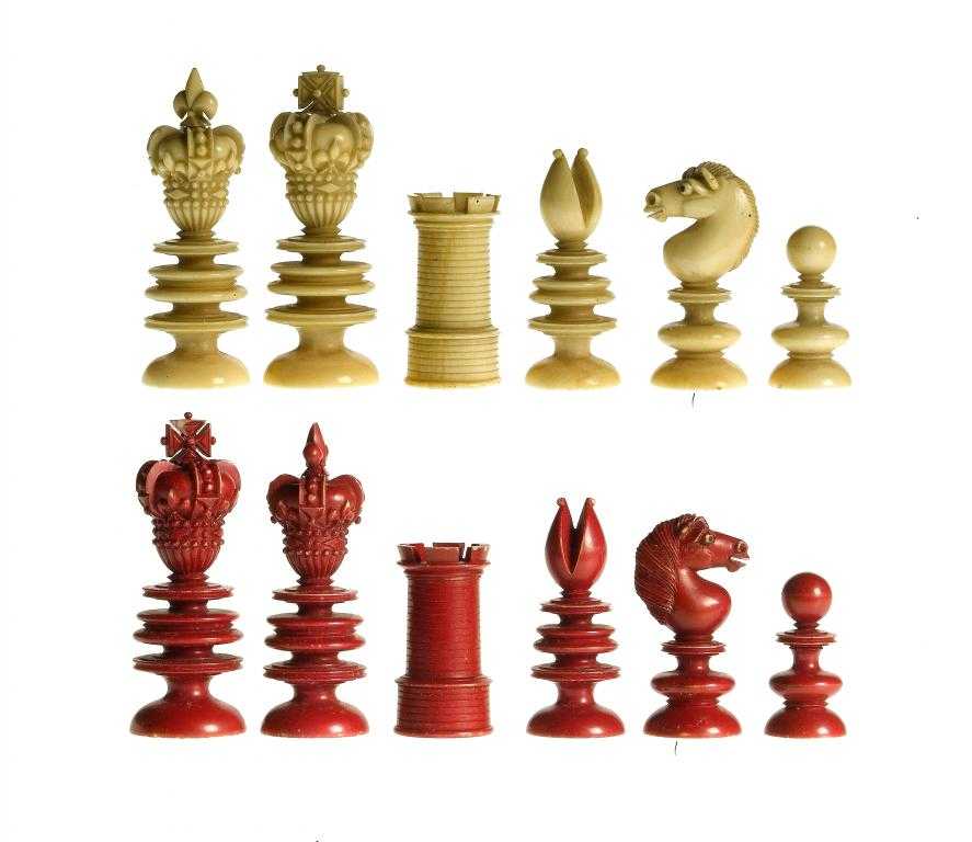 Appraisal: AN ENGLISH BONE CHESS SET stained red and natural the