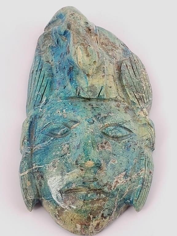 Appraisal: Large polished turquoise stone carved into a face with gecko