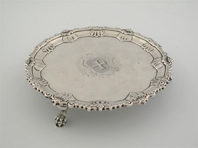 Appraisal: An early George II waiter with an ornate gadroon and