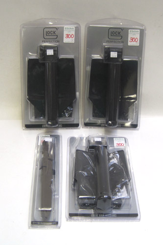 Appraisal: FOUR GLOCK SURVIVAL ITEMS three folding shovels E-Tool with pouches