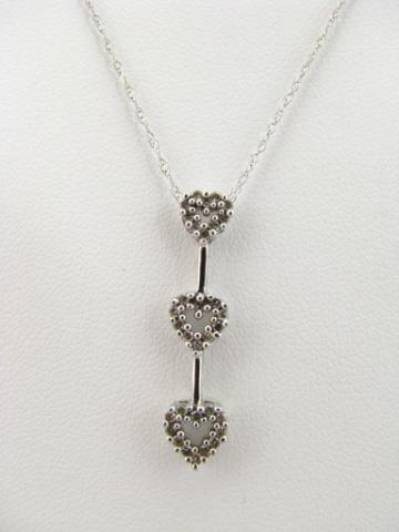 Appraisal: K white gold necklace with diamond three heart dangle pendant