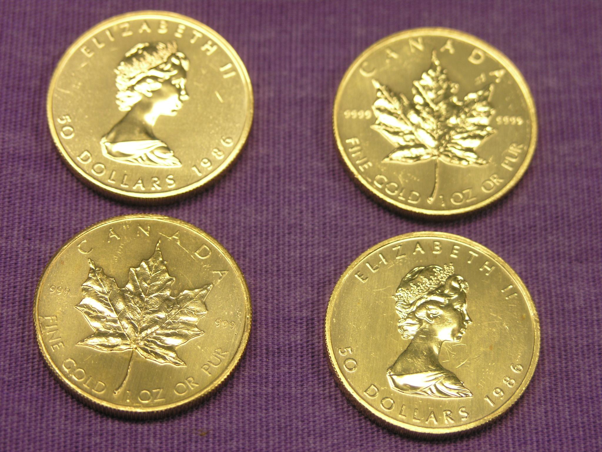 Appraisal: Four Canadian Dollars gold coins