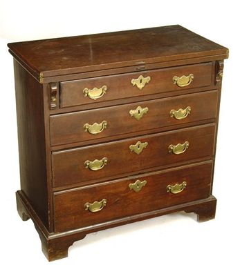 Appraisal: An early George III mahogany bachelor's chest the hinged fold-over