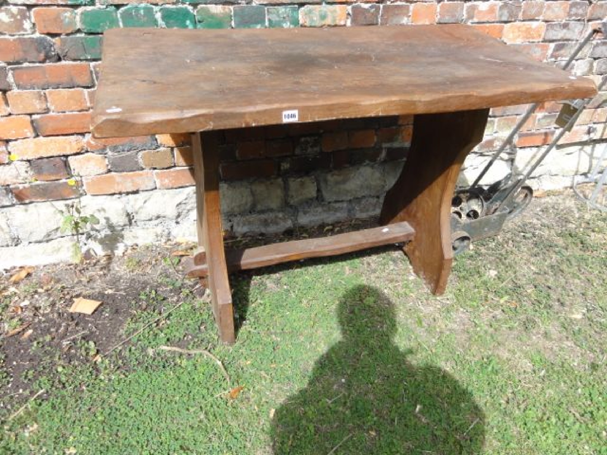 Appraisal: A small stained elm refectory type table the rectangular top