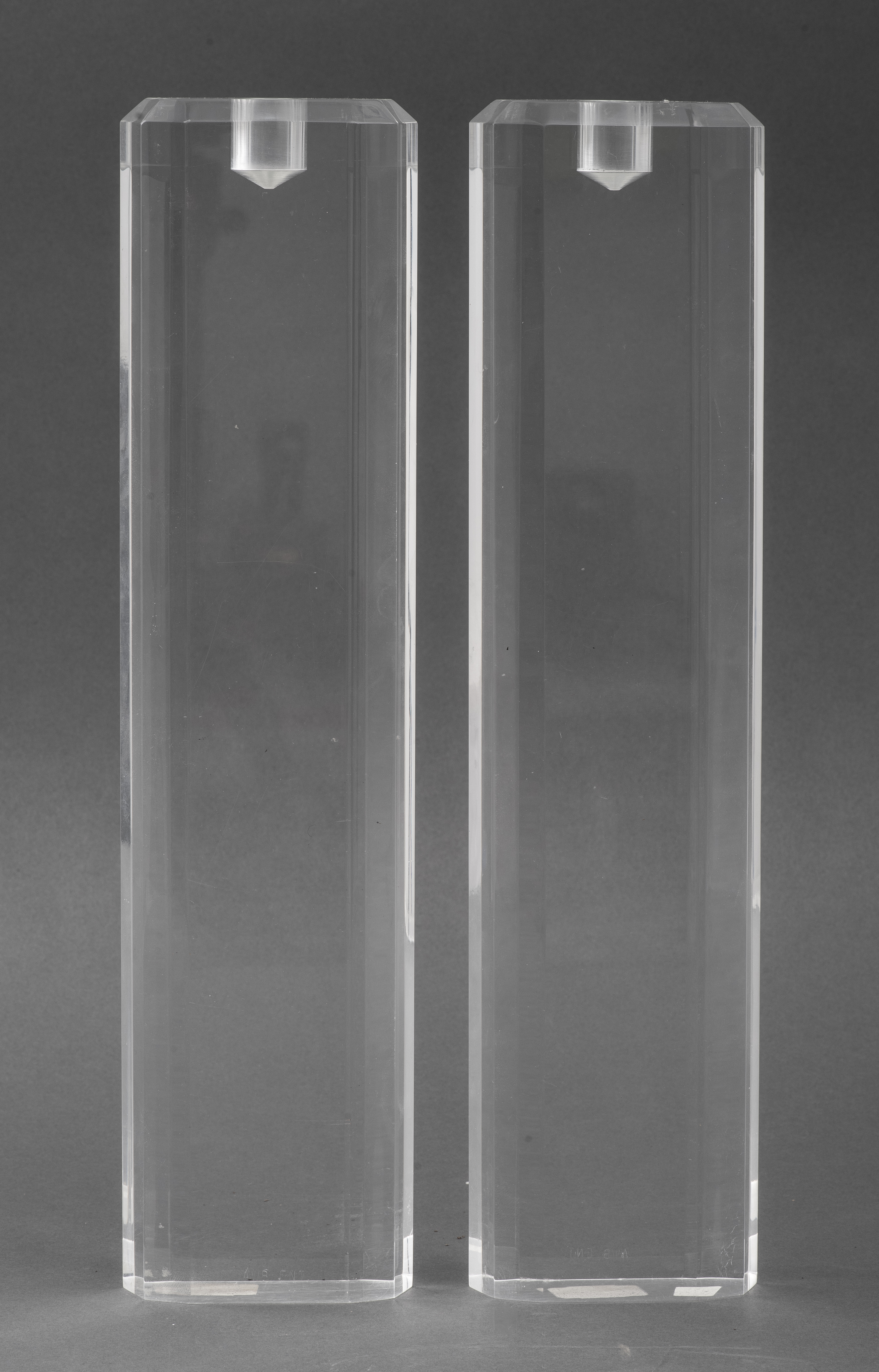 Appraisal: TALL LUCITE CANDLESTICKS PAIR Pair of tall lucite candlesticks marked