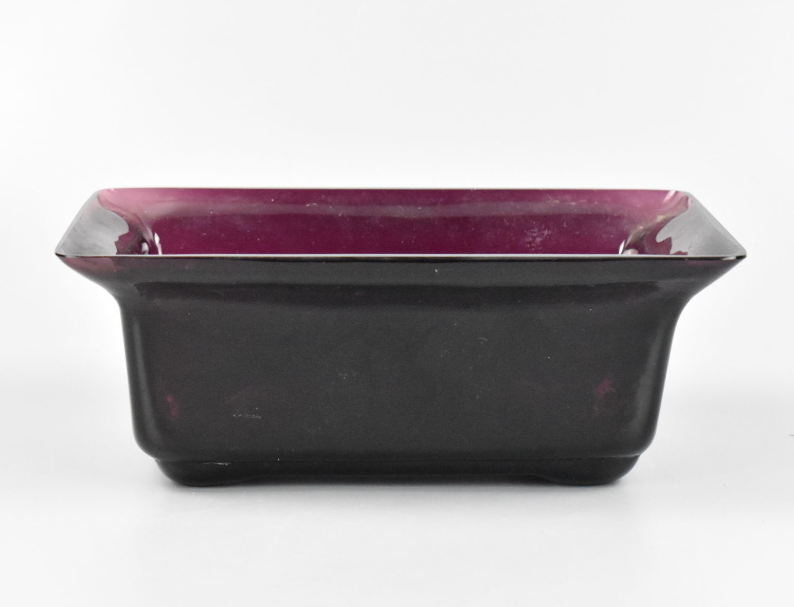 Appraisal: A thick Chinese Peking glass flower basin dark purple glass