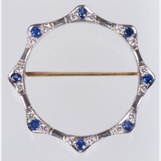 Appraisal: A Platinum Diamond and Sapphire Brooch A Platinum Diamond and