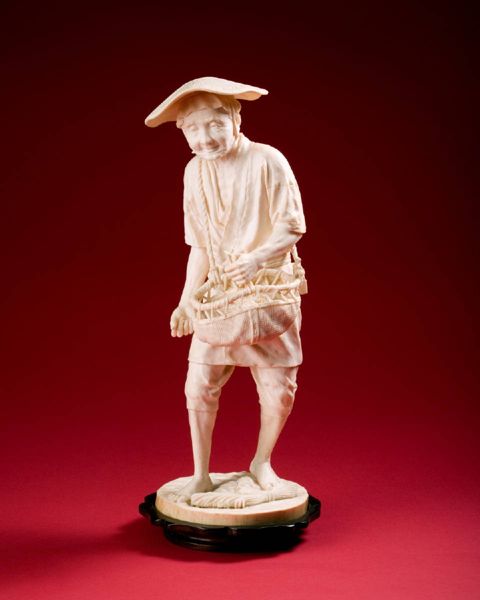 Appraisal: JAPANESE CARVED IVORY FIGURE OF A FARMER MEIJI PERIOD With