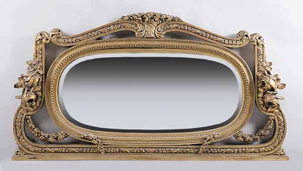 Appraisal: A Belle poque Carved Giltwood Overmantel Mirror the crest with