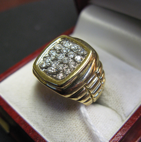 Appraisal: MAN'S DIAMOND AND FOURTEEN KARAT GOLD PINKIE RING the setting