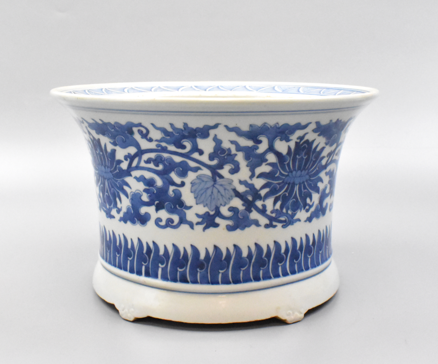 Appraisal: Chinese blue and white planter Planter has five short feet