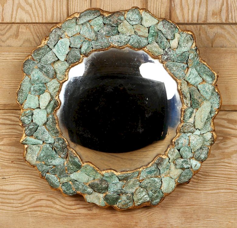 Appraisal: PETITE MIRROR FORM OF STYLIZED FLOWER CONVEX A petite mirror