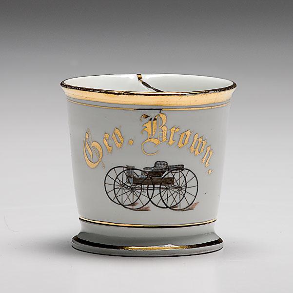 Appraisal: FINE CARRIAGE MAKER'S MUSTACHE MUG porcelain with separate compartment Polychrome