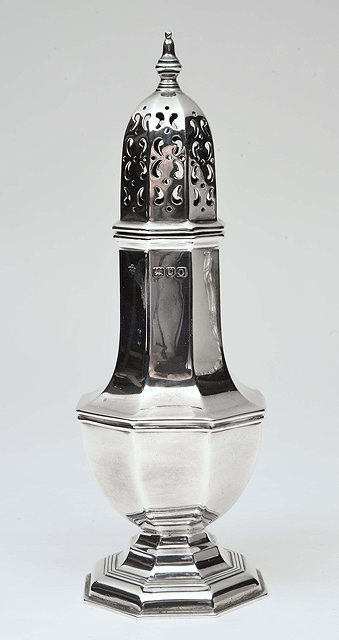 Appraisal: AN EARLY TH CENTURY SILVER CASTER of faceted form with