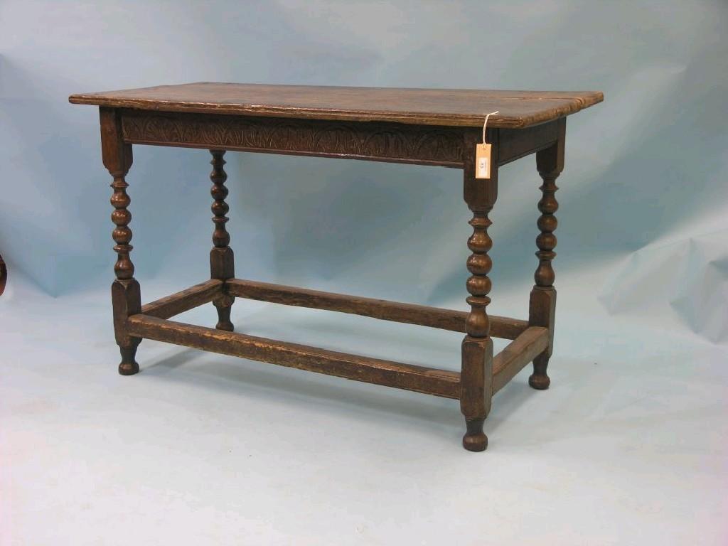 Appraisal: A late th century oak centre table rectangular-shape the frieze