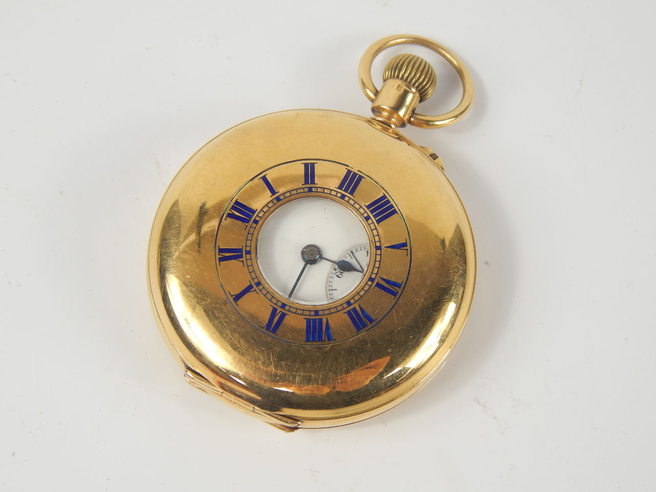 Appraisal: An ct gold gentleman's half hunting cased keyless wind pocket